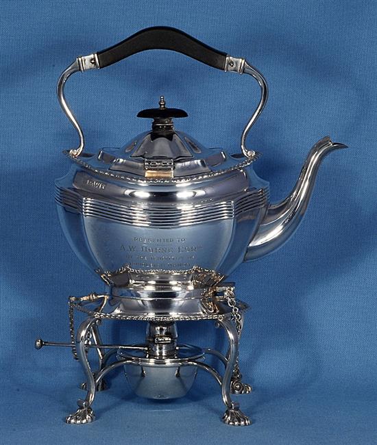 A silver kettle on stand, Height 11 ½”/290mm Width: 9”/230mm Weight 42.8oz/1213g.